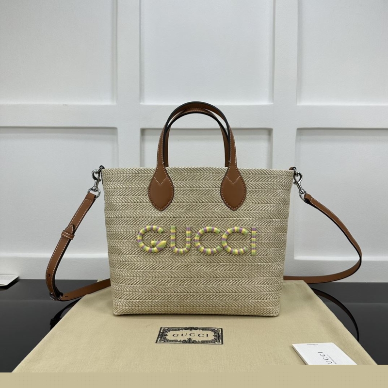 G*u*i shopping bags